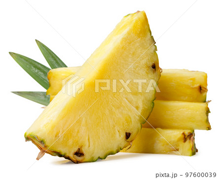 Pieces of pineapple with leaves on a white background. Isolated Pieces of pineapple with leaves on a white background. Isolated 97600039