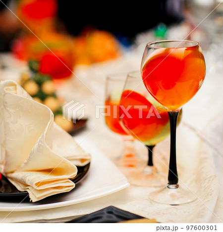 glasses of cocktails on the Christmas table. 97600301
