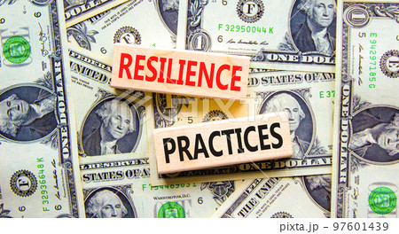 Resilience practices symbol. Concept word Resilience practices typed wooden blocks. Beautiful background from dollar bills. Business and resilience practices concept. Copy space. Resilience practices symbol. Concept word Resilience practices typed wooden blocks. Beautiful background from dollar bills. Business and resilience practices concept. Copy space. 97601439