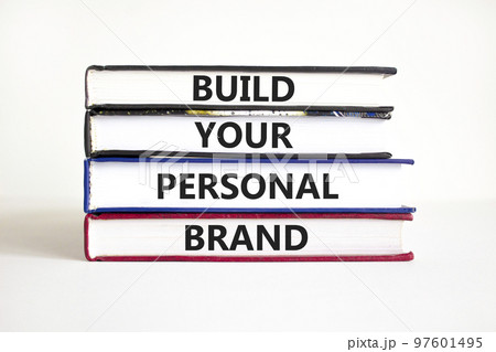 Build your personal brand symbol. Concept words Build your personal brand on books. Beautiful white background. Build your personal brand business concept. Copy space. 97601495