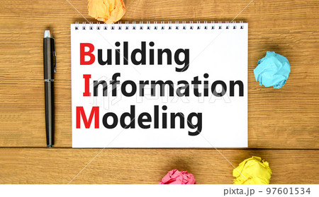 BIM building information modeling symbol. Concept words BIM building information modeling on white note on beautiful wooden background. Business BIM building information modeling concept. Copy space. BIM building information modeling symbol. Concept words BIM building information modeling on white note on beautiful wooden background. Business BIM building information modeling concept. Copy space. 97601534