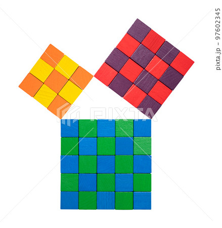 Pythagorean theorem, shown with subdivided colorful wooden cubes. Relation of sides of a right triangle. The two smaller squares together have the same area as the big one. Isolated, from above. Photo 97602345
