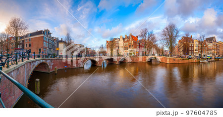 Amsterdam, Netherlands Bridges and Canals at Twilight. 97604785