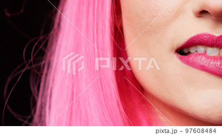 Beauty model with pink lipstick biting lips on camera, feeling sensual and attractive in studio. Confident carefree girl with beautiful mouth acting flirty and hot. Extreme closeup, macro shot. Beauty model with pink lipstick biting lips on camera, feeling sensual and attractive in studio. Confident carefree girl with beautiful mouth acting flirty and hot. Extreme closeup, macro shot. 97608484