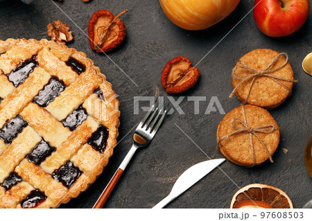 Berry tart pie on black table close up 97608503