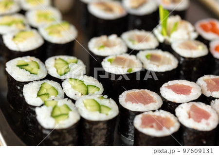 Set of maki sushi on metal tray Set of maki sushi on metal tray 97609131