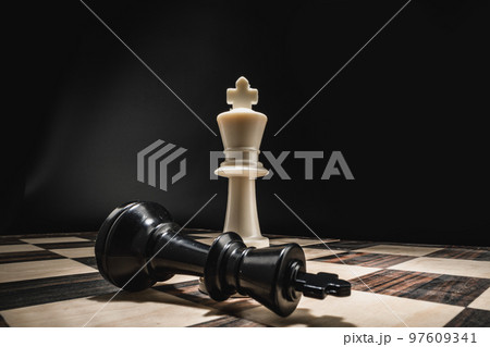 Chess board with figures on dark background 97609341