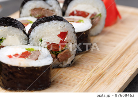 Maki sushi roll served on plate close up 97609462