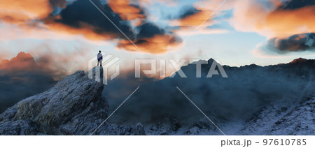 Adventure man on Rocky Mountain Landscape. Nature Background. 97610785