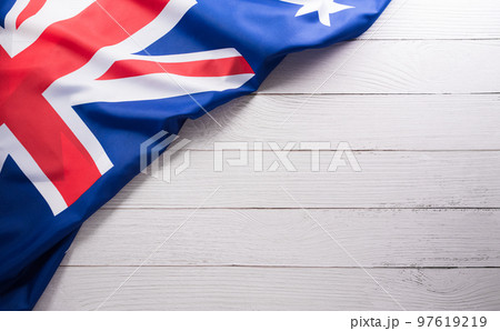 Happy Australia day concept. Australian flag against white wooden background. 26 January. Happy Australia day concept. Australian flag against white wooden background. 26 January. 97619219