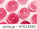Fresh grapefruit slices in Viva magenta - color of year 2023. summer concept 97619365