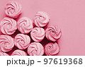 Colorful marshmallows on magenta background. Color of year 2023. Viva magenta. Color sweet homemade zephyr 97619368