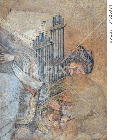 Saint Cecilia, fresco on house facade in Zagreb, Croatia 97620384