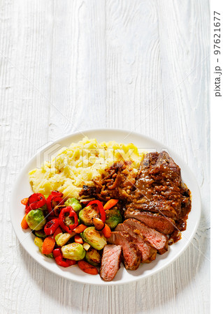 beef steak with potato mash and roasted vegetables 97621677