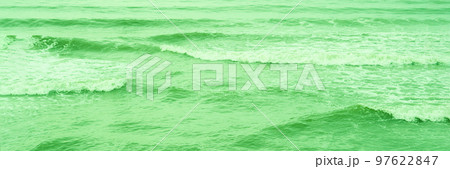 Real photo sea water waves, abstract background, nature power, bright green more tone in stock 97622847