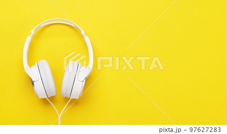 Headphones on yellow 97627283