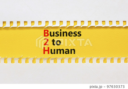 B2H business to human symbol. Concept words B2H business to human on white white paper on a beautiful yellow background. Business and B2H business to human concept. Copy space. 97630373