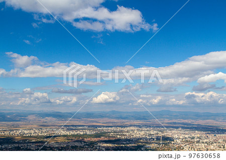 Aerial view of the city of Sofia, Bulgaria. The capital of Bulgaria is located in the west of the country at the foot of the Vitosha mountain range. History of city has more than two thousand years. Aerial view of the city of Sofia, Bulgaria. The capital of Bulgaria is located in the west of the country at the foot of the Vitosha mountain range. History of city has more than two thousand years. 97630658