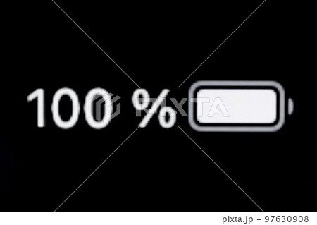 Smartphone full charged battery level indicator - 100 percent: close up macro 97630908