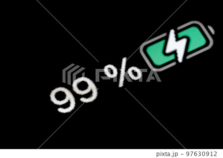Battery level indicator charging process - white number: ninety-nine, 99 percent 97630912