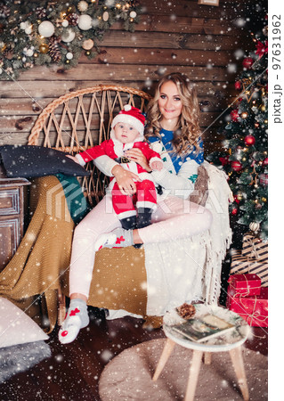 Beautiful blonde woman and her child enjoying 97631962