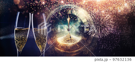 new year background with champagne glasses and fireworks 97632136