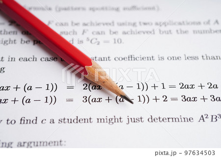 Pencil on mathematic formula exercise test paper in education school. 97634503