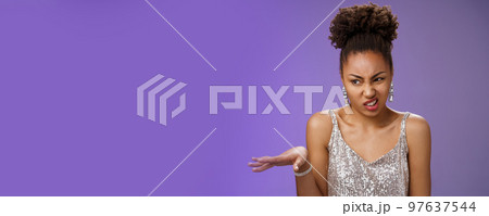 Arrogant peeky african-american woman in shiny luxurious dress cringing aversion wave away dislike aversion expressing disgust contempt speaking reluctant disappointed, grimacing 97637544