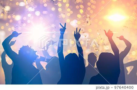 Party. People dancing in night club. many party people dancing bright lights, confetti flying everywhere nightclub event hands. Festival, Party People Club Concert 97640400