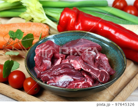Raw deer meat for venison ragout or goulash 97645326