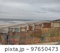 Gloomy View of Rusty Protective Border Wall Mexico Tijuana and United States 97650473