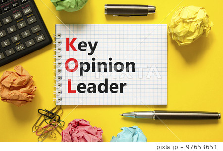 KOL key opinion leader symbol. Concept words KOL key opinion leader on white note on a beautiful yellow background. Calculator. Business KOL key opinion leader concept. Copy space. 97653651