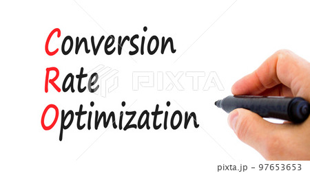 CRO conversion rate optimization symbol. Concept words CRO conversion rate optimization on a beautiful white background. Businessman hand. Business CRO conversion rate optimization concept. Copy space 97653653