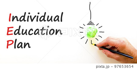 IEP individual education plan symbol. Concept words IEP individual education plan on paper on a beautiful white background. Light bulb icon. Business IEP individual education plan concept. Copy space 97653654