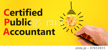 CPA certified public accountant symbol. Concept words CPA certified public accountant on a beautiful yellow background. Light bulb. Business and CPA certified public accountant concept. Copy space. 97653655