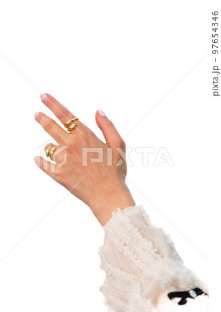 Woman hand with Bold Adjustable Golden Rings set against a white background. Woman hand with Bold Adjustable Golden Rings set against a white background. 97654346