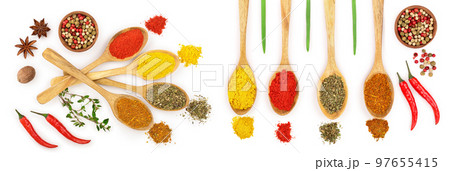 mix of spices in wooden spoon isolated on a white background. Top view. Flat lay. Set or collection 97655415