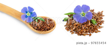 flax seeds in wooden spoon with flower isolated on white background flax seeds in wooden spoon with flower isolated on white background 97655454