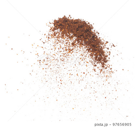 Red Hot Chilli flying explosion, red grain chilli explode abstract cloud fly. Beautiful complete seed chilly splash in air, food object design. Selective focus freeze shot white background isolated 97656905