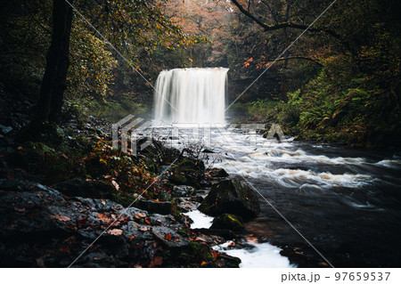 Sgwd yr Eira waterfall or Fall of Snow along the Four Waterfalls walk, Waterfall Country, Brecon Beacons national park, South Wales, the United Kingdom 97659537