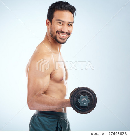 Portrait, fitness or man training with dumbbell in workout or exercise in studio for strong arms, biceps or body goals. Muscles, mindset or happy bodybuilder sports athlete weightlifting with mock up 97663828