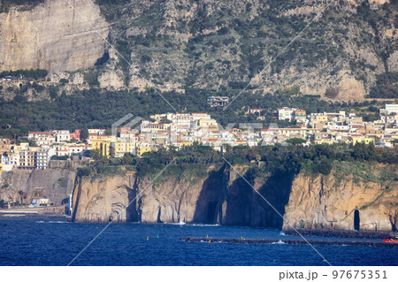 Rocky Coast and Homes in Touristic Town, Sorrento, Italy 97675351