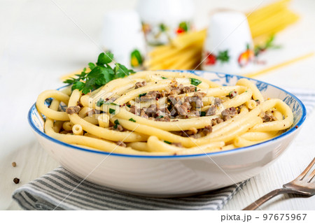 Homemade pasta with meat and herbs. 97675967