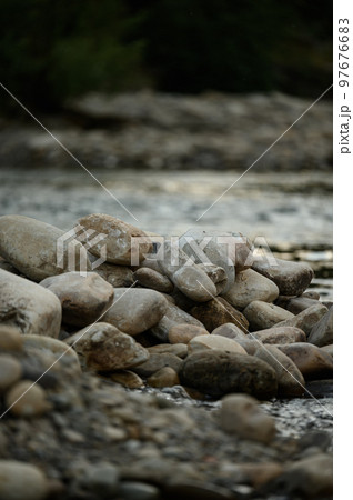 Coastal stones near the water, a place for copy space. Coastal stones near the water, a place for copy space. 97676683