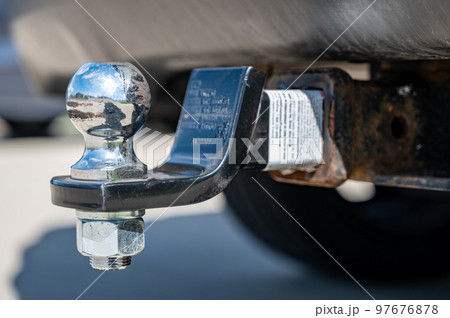 2 inch trailer ball hitch mounted on the back of a vehicle 97676878