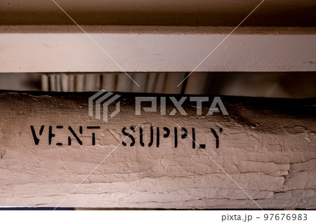 Ventilation supply line with a thermal wrapping inside an industrial area. Ventilation supply line with a thermal wrapping inside an industrial area. 97676983