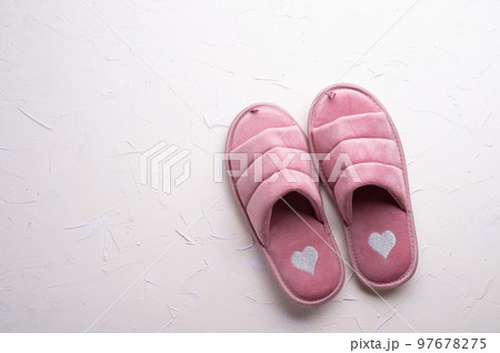 cozy home pink  slippers   against white background. concept composition 97678275