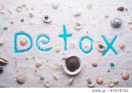 Detox salt with black clay  marine shells background. Healthy concept 97678782