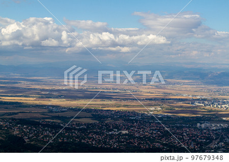 Aerial view of the city of Sofia, Bulgaria. The capital of Bulgaria is located in the west of the country at the foot of the Vitosha mountain range. History of city has more than two thousand years. Aerial view of the city of Sofia, Bulgaria. The capital of Bulgaria is located in the west of the country at the foot of the Vitosha mountain range. History of city has more than two thousand years. 97679348