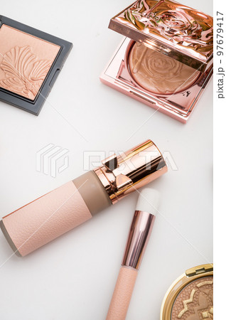 Set of luxury cosmetics for fashion make up on white background Set of luxury cosmetics for fashion make up on white background 97679417